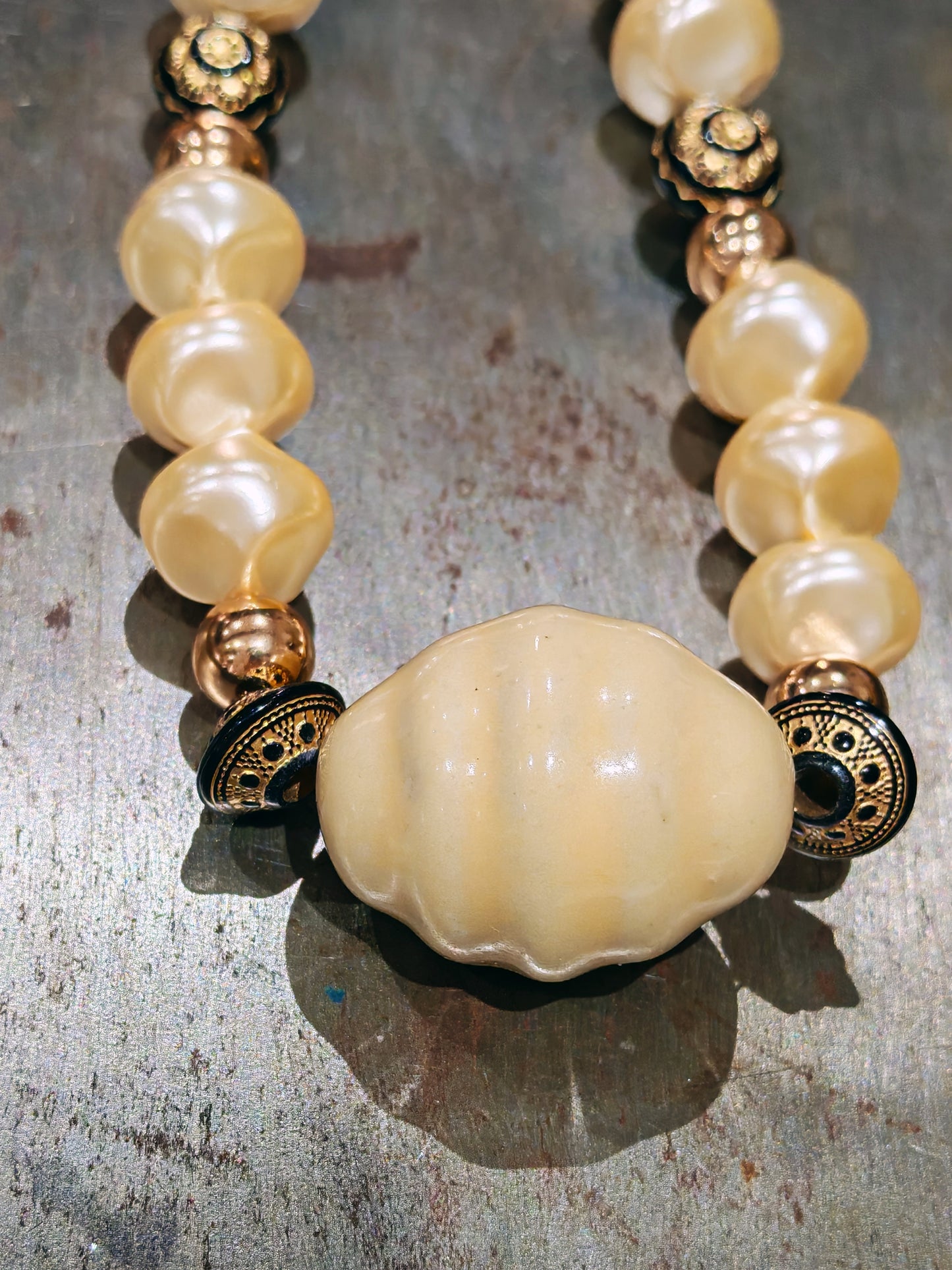 COLLIER GRETA
